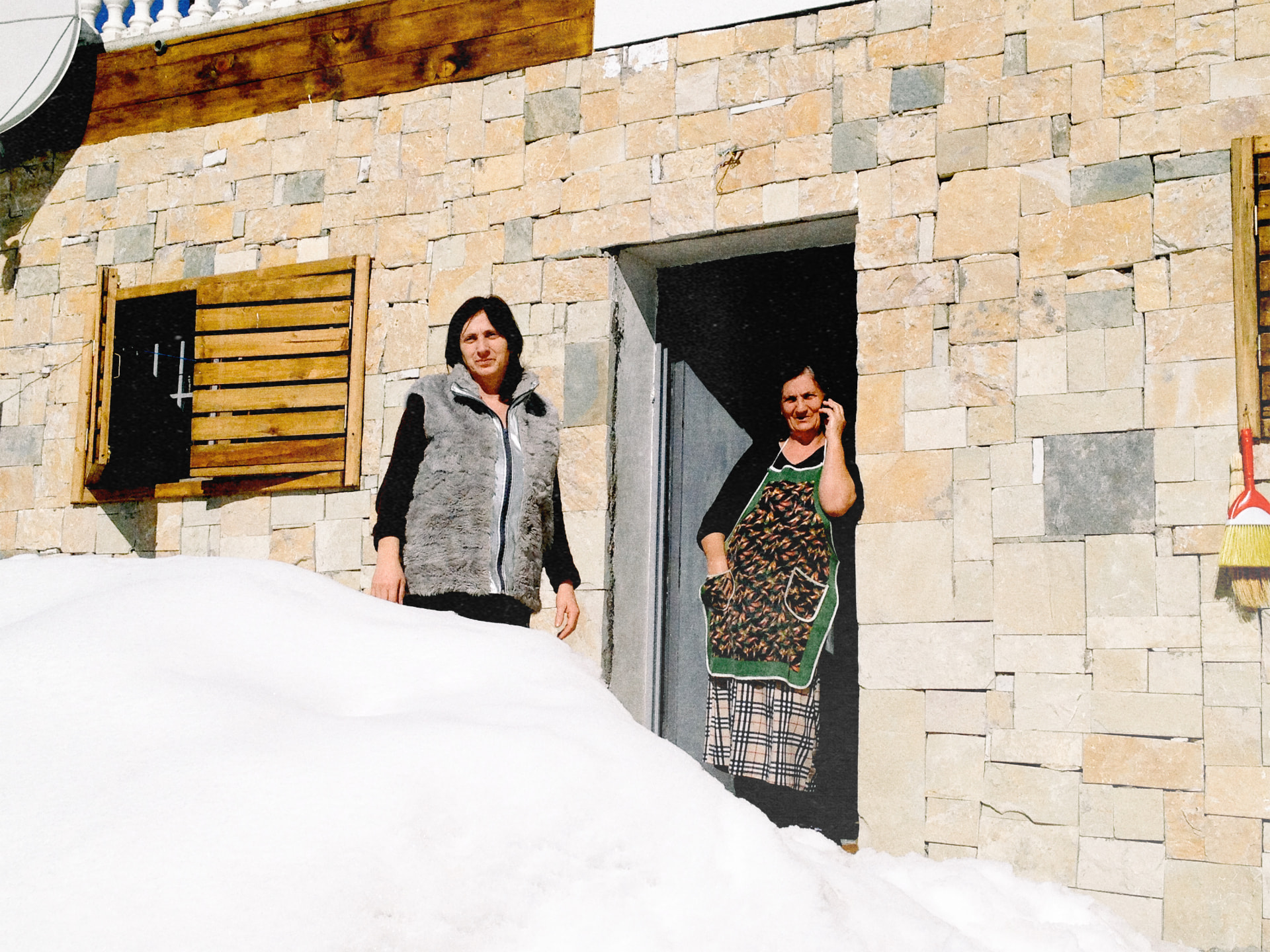 Local women outside a stone house, Gudauri 2012